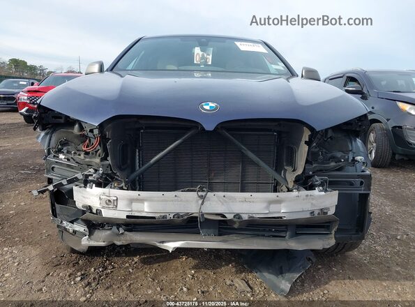 5UXCY8C01L9C99998 2020 BMW X6 Blue Вид задньої частини салону