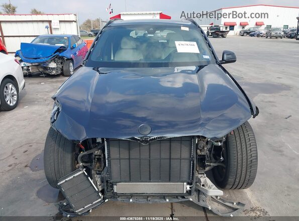 5UXJU4C07N9M70409 2022 BMW X5 Dark Blue Vista interior trasera