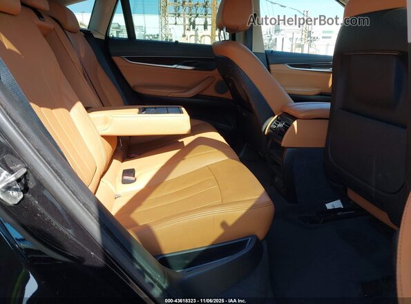 5UXKU0C55G0F92432 2016 BMW X6 Black Vista de la etiqueta del VIN