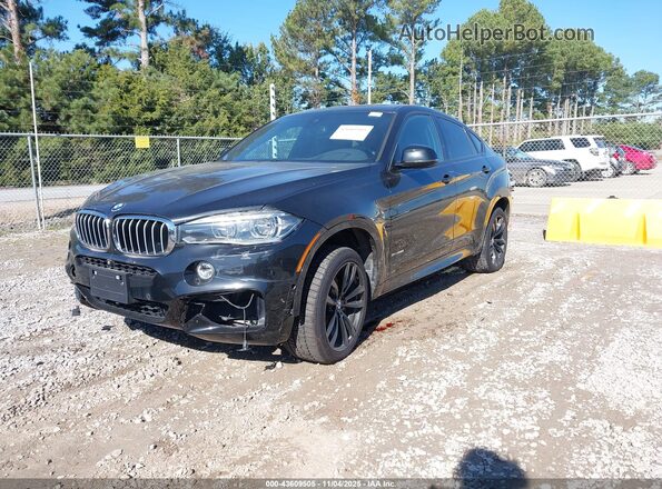 5UXKU6C58KLP60457 2019 BMW X6 Black წინა მარცხენა ხედი სამი მეოთხედიდან