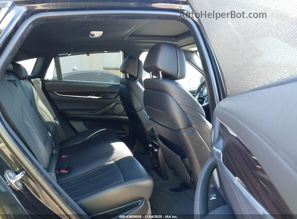 5UXKU6C58KLP60457 2019 BMW X6 Black VIN კოდის სტიკერის ხედი