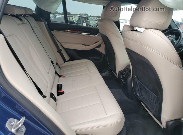 5UXTY5C0XM9H67548 2021 BMW X3 Blue Vista interior trasera