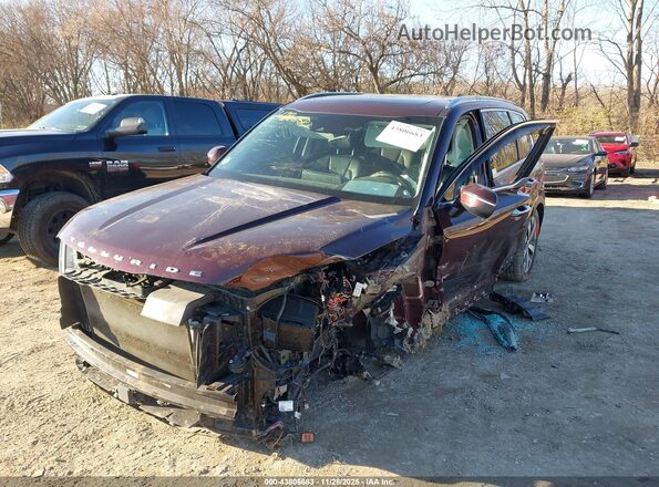 5XYP6DHC9NG200699 2022 KIA TELLURIDE Burgundy Vista tres cuartos delantera izquierda