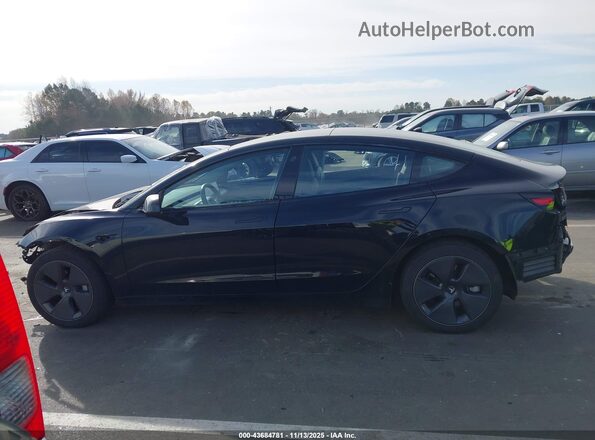 5YJ3E1EB0NF124955 2022 TESLA MODEL 3 Black Widok wnętrza z tyłu