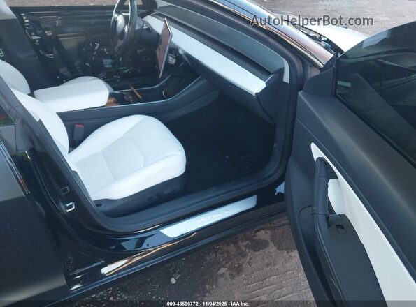 5YJ3E1EB6KF391870 2019 TESLA MODEL 3 Черный Вид салона спереди