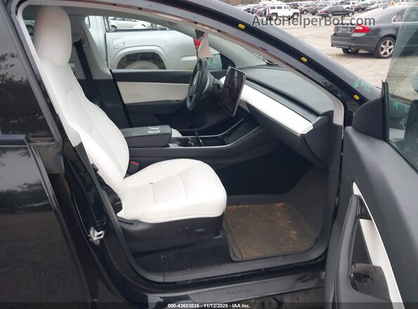 5YJYGDEE5LF049453 2020 TESLA MODEL Y Black Вид салону спереду