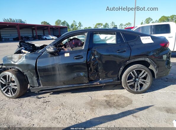 5YMCY0C04M9G12375 2021 BMW X6 M Black 