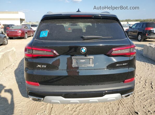 5UXCR6C01P9P19652 2023 BMW X5 Black Vista interior delantera