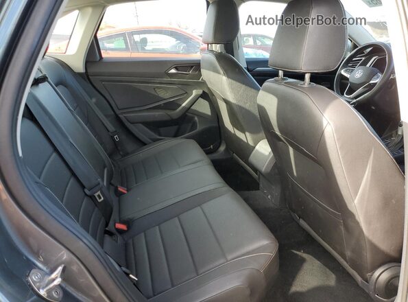 3VWEM7BU7RM009370 2024 VOLKSWAGEN JETTA Серый Вид задней части салона
