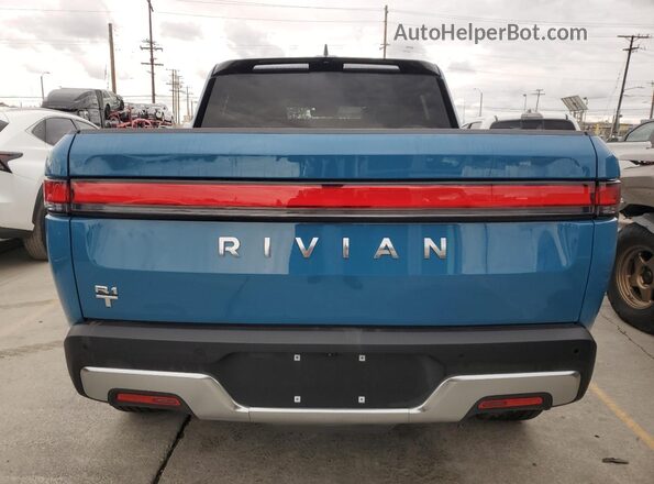 7FCTGCAA3RN030878 2024 RIVIAN R1T Blue Հետևի տեսք