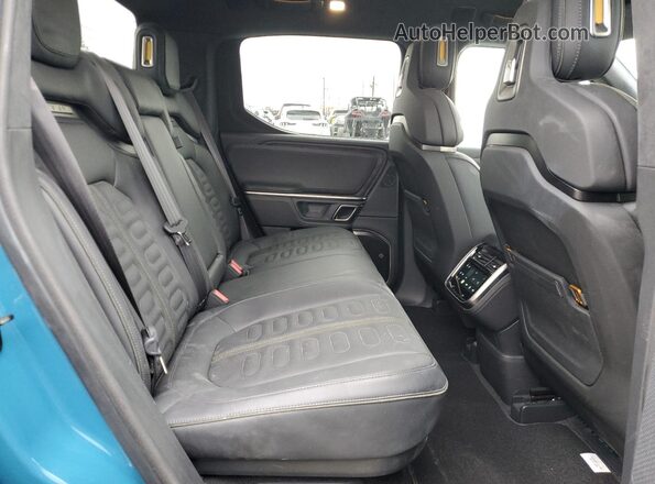 7FCTGCAA3RN030878 2024 RIVIAN R1T Blue Հետևի նստատեղերի տեսք