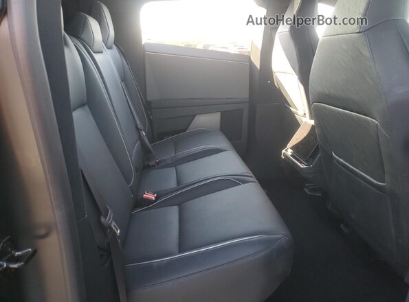 7G2CEHED1RA048818 2024 TESLA CYBERTRUCK Green Vista de los asientos traseros