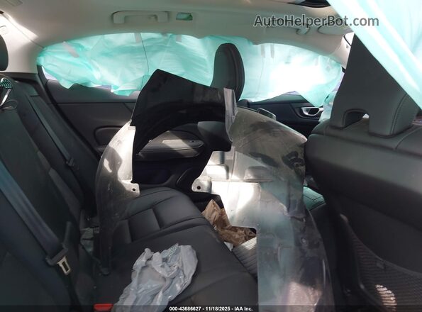 7JRH60FL6RG326717 2024 VOLVO S60 RECHARGE PLUG-IN HYBRID Teal Widok naklejki z numerem VIN