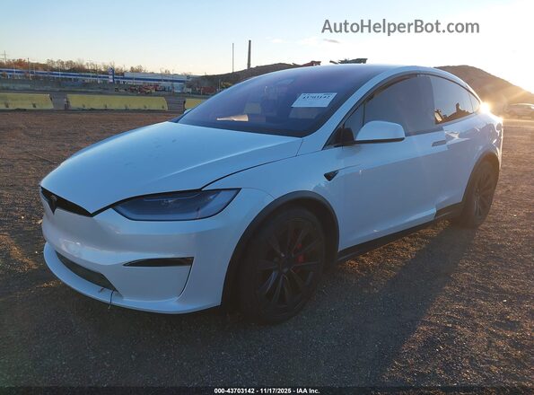 7SAXCBE60RF440557 2024 TESLA MODEL X Black Передня ліва чверть
