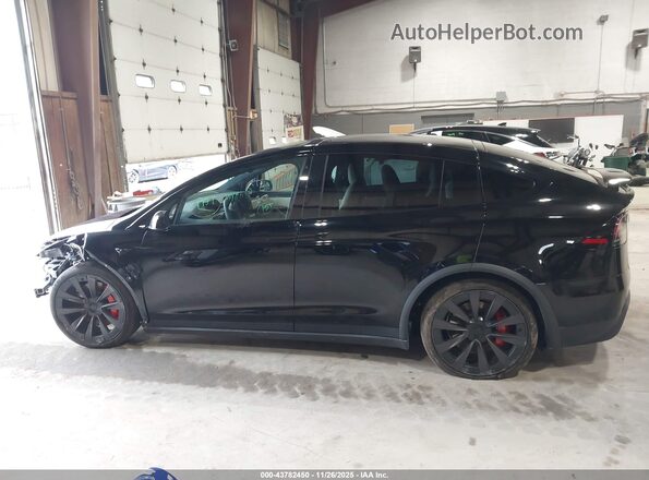 7SAXCBE66RF460974 2024 TESLA MODEL X Black 360 interior view