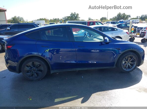 7SAYGAEE6RF155047 2024 TESLA MODEL Y Blue Սալոնի հետևի տեսք