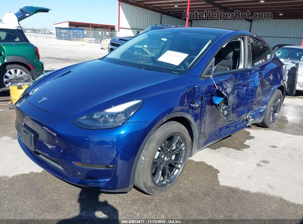7SAYGAEE6RF155047 2024 TESLA MODEL Y Blue Առջևի ձախ երեք քառորդ տեսարան