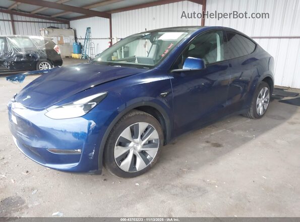 7SAYGAEE9PF873897 2023 TESLA MODEL Y Blue Przód lewy