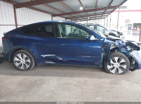 7SAYGAEE9PF873897 2023 TESLA MODEL Y Blue Widok wnętrza z tyłu