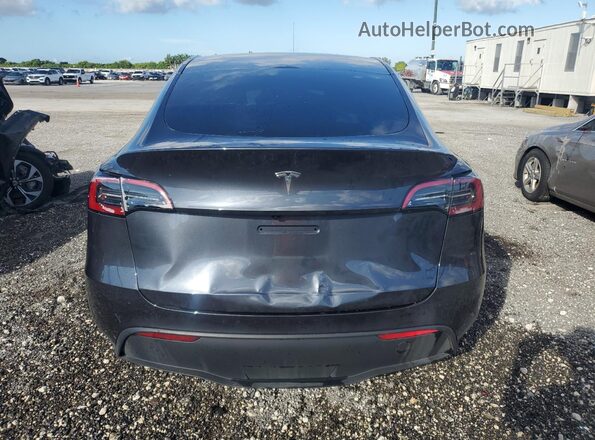 7SAYGDED1SA365292 2025 TESLA MODEL Charcoal Հետևի տեսք