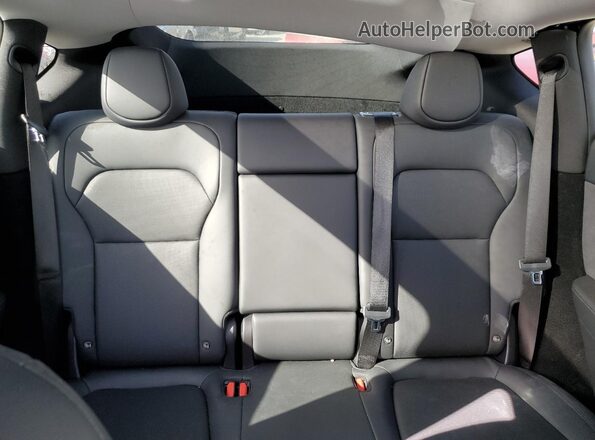 7SAYGDED2TF378699 2026 TESLA MODEL Gray Vista de los asientos traseros
