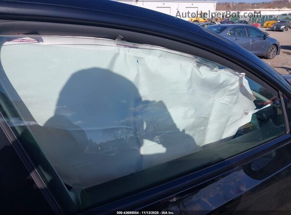7SAYGDED7SA371551 2025 TESLA MODEL Y Black Widok wnętrza z przodu