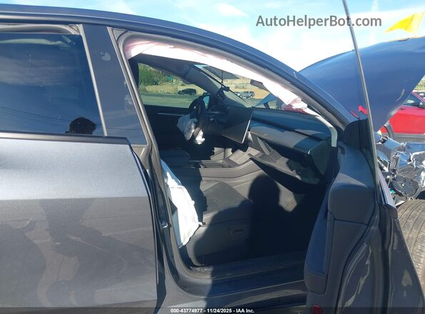 7SAYGDEE0RA216715 2024 TESLA MODEL Y Gray Vista interior delantera