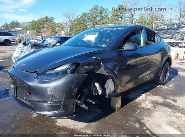 7SAYGDEE2RF166645 2024 TESLA MODEL Y Gray Առջևի ձախ երեք քառորդ տեսարան