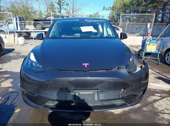 7SAYGDEE2RF166645 2024 TESLA MODEL Y Gray Սալոնի հետևի տեսք