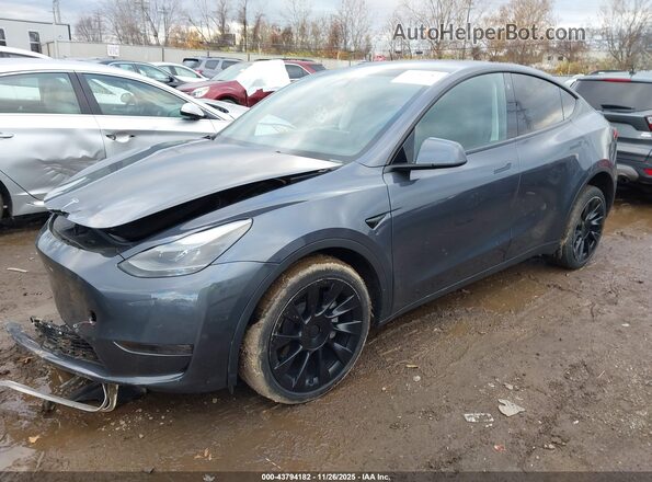 7SAYGDEE3PF708588 2023 TESLA MODEL Y Gray Przód lewy