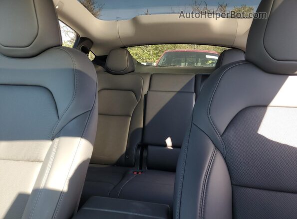 7SAYGDEE3TA440438 2026 TESLA MODEL Blue Vista de los asientos traseros