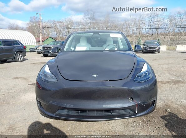 7SAYGDEE6RA321209 2024 TESLA MODEL Y Gray Vista interior trasera