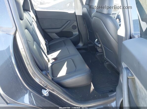 7SAYGDEE7RF198376 2024 TESLA MODEL Y Black VIN კოდის სტიკერის ხედი