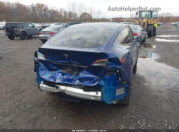 7SAYGDEE8RA217935 2024 TESLA MODEL Y Dark Blue 
