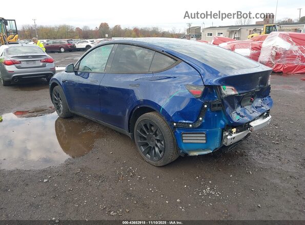 7SAYGDEE8RA217935 2024 TESLA MODEL Y Dark Blue Trasero izquierdo