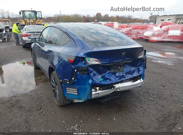 7SAYGDEE8RA217935 2024 TESLA MODEL Y Dark Blue Vista frontal