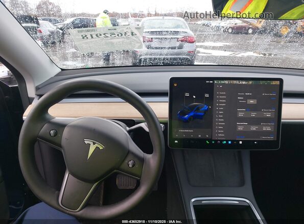7SAYGDEE8RA217935 2024 TESLA MODEL Y Dark Blue 