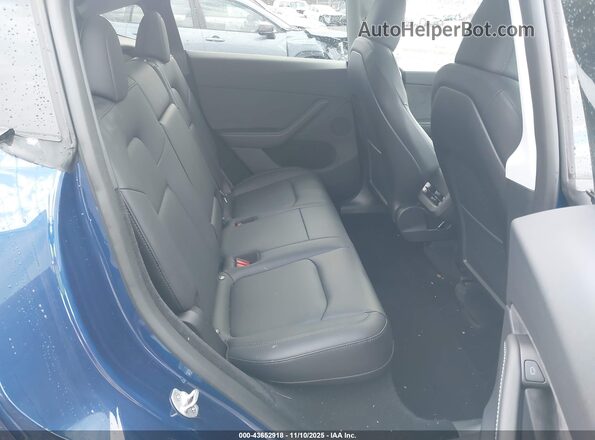 7SAYGDEE8RA217935 2024 TESLA MODEL Y Dark Blue Vista de la etiqueta del VIN