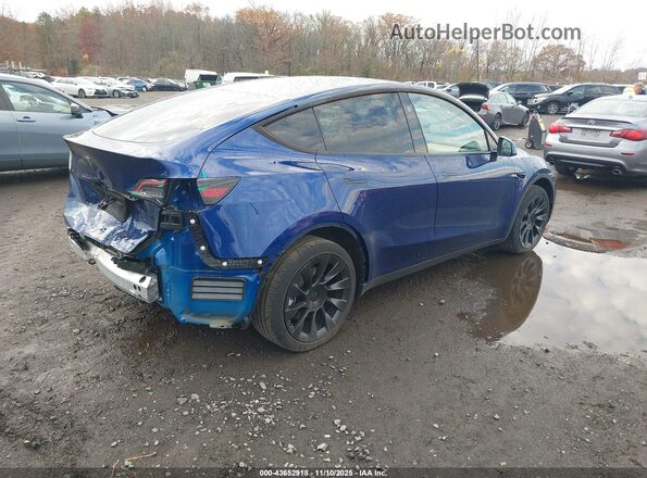 7SAYGDEE8RA217935 2024 TESLA MODEL Y Dark Blue Trasero derecho