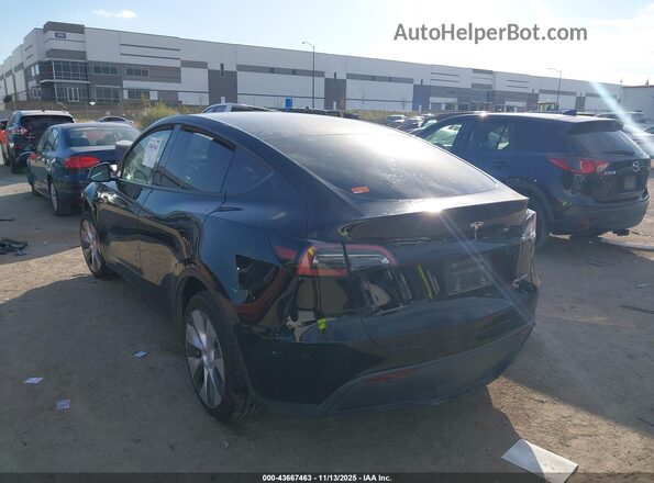 7SAYGDEE9PA151523 2023 TESLA MODEL Y Black Tył lewy