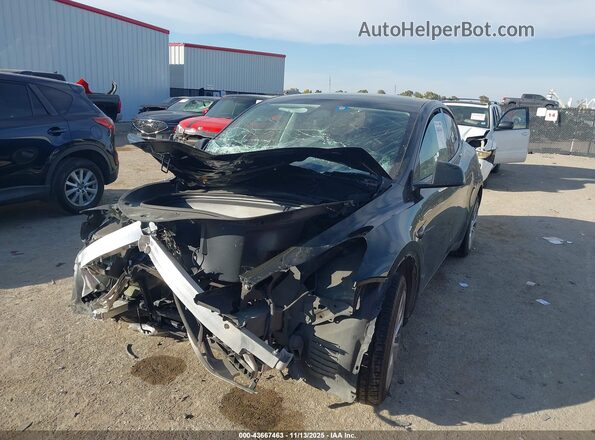 7SAYGDEE9PA151523 2023 TESLA MODEL Y Black Przód lewy