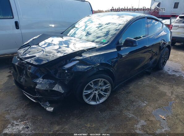 7SAYGDEEXRA218228 2024 TESLA MODEL Y Black Vista tres cuartos delantera izquierda