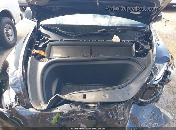 7SAYGDEEXRA218228 2024 TESLA MODEL Y Black Vista trasera