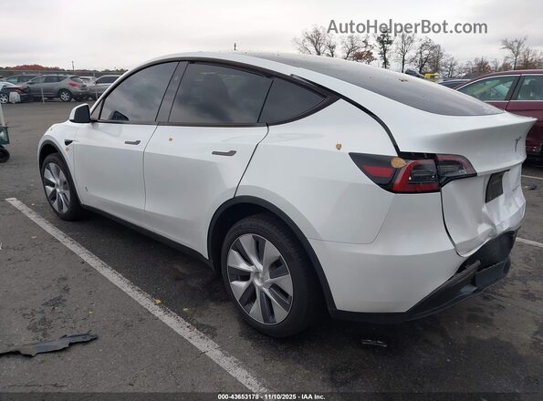 7SAYGDEEXRA278932 2024 TESLA MODEL Y White Tył lewy