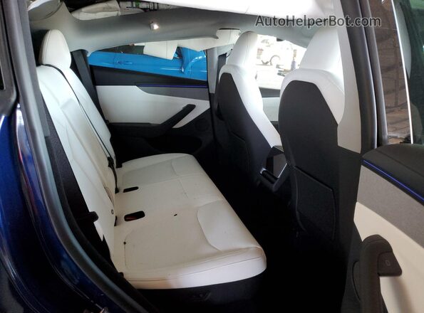 7SAYGDEEXTF438897 2026 TESLA MODEL Blue Вид задніх сидінь