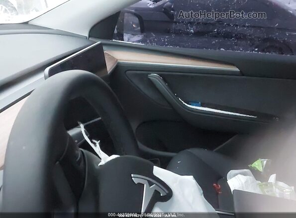 7SAYGDEF2SA338622 2025 TESLA MODEL Y Black უკანა სავარძლების ხედი
