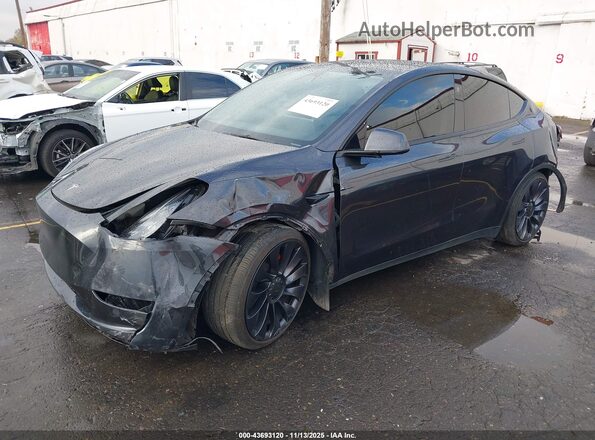 7SAYGDEF8RF089515 2024 TESLA MODEL Y Gray წინა მარცხენა ხედი სამი მეოთხედიდან