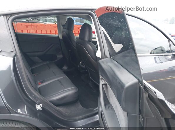 7SAYGDEF8RF089515 2024 TESLA MODEL Y Gray VIN კოდის სტიკერის ხედი