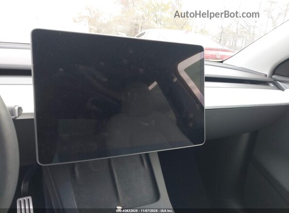 7SAYGDEF9RA265727 2024 TESLA MODEL Y Brown Rear seats view