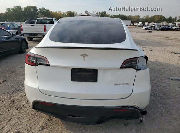 7SAYGDEFXNF452780 2022 TESLA MODEL White Հետևի տեսք
